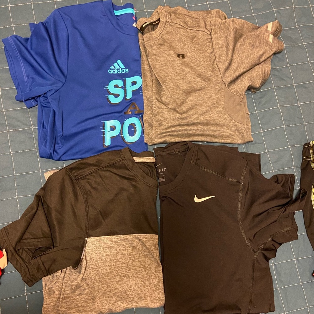 4 athletic shirts